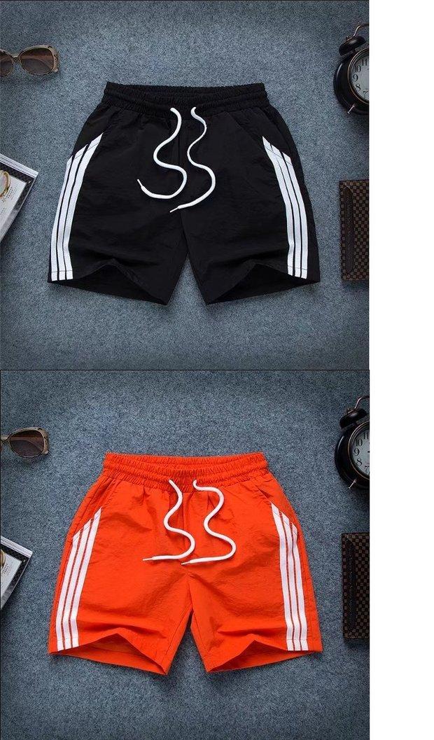 Mua một tặng một cặp quần short miễn phí Người đàn ông đỏ nhanh với anh chàng tinh thần xã hội mỏng phần ba quần thủy triều quần short kaki nam