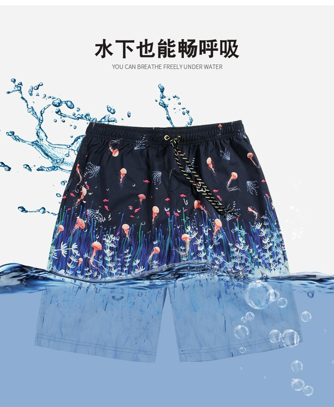 Sand in quần rộng in quần đi biển mùa hè nam nghỉ hè kích thước lớn quần short boxer Hàn Quốc giản dị năm điểm quần short - Quần bãi biển