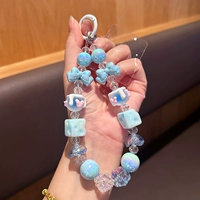 Мобильный телефон с бантиком, синий ремешок