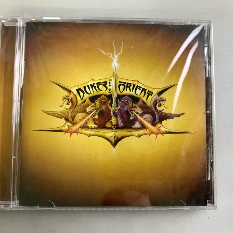Итальянская версия нераспечатанного альбома rock Dukes of the Orient "Dukes of the CD" Изображение 1
