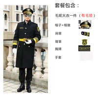 Черное пальто с меховым воротником, желтыми аксессуарами и шляпой с большими полями.