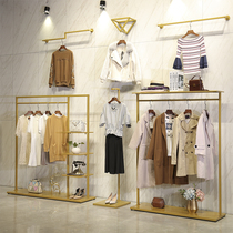 Floor-to-ceiling gold clothing store display rack Womens store shelf display table Hanging clothes rack Wall hanging clothes rack