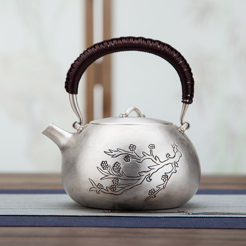 Silver pot pure silver 999 burnt kettle pure handmade tea road tea set Tea Tea Bubble Teapot Hand a beat sketch Plum Blossom Silver Pot