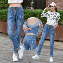 Spring and summer high-waisted jeans womens 2021 new perforated straight elastic waist loose trousers nine-point radish pants