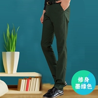 Темно -зеленые брюки