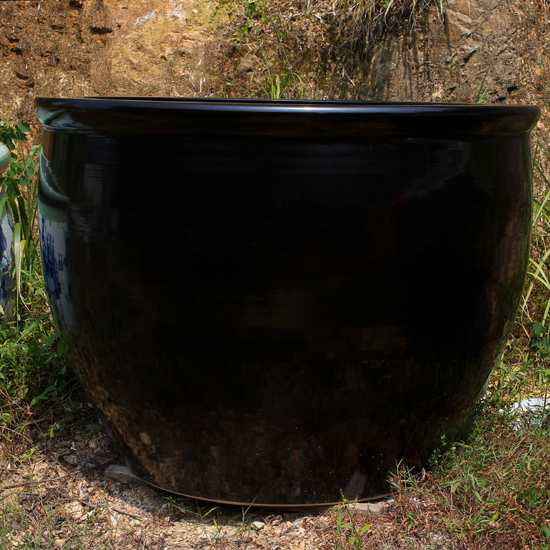 Jingdezhen ceramic fish tank Feng Shui lucky town house large water tank black black gold glaze water lily tank
