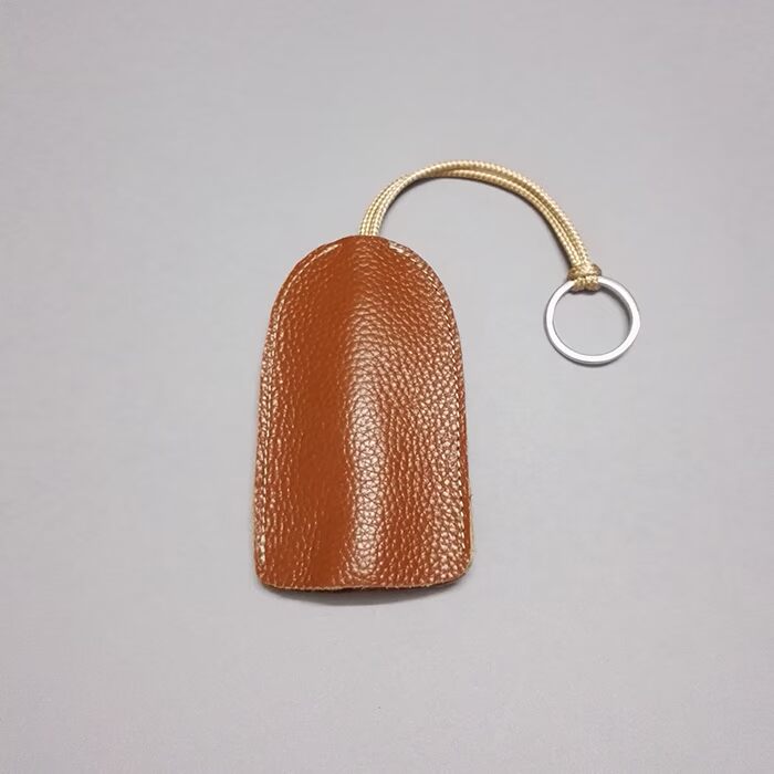 Túi da sáng tạo túi chìa khóa Nhật Bản và Hàn Quốc mini dây rút đơn giản túi da túi chìa khóa lớn hộp đựng chìa khóa