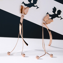 Isias new creative titanium steel series earrings hot sale long symmetrical four-leaf clover butterfly shape tassel earrings