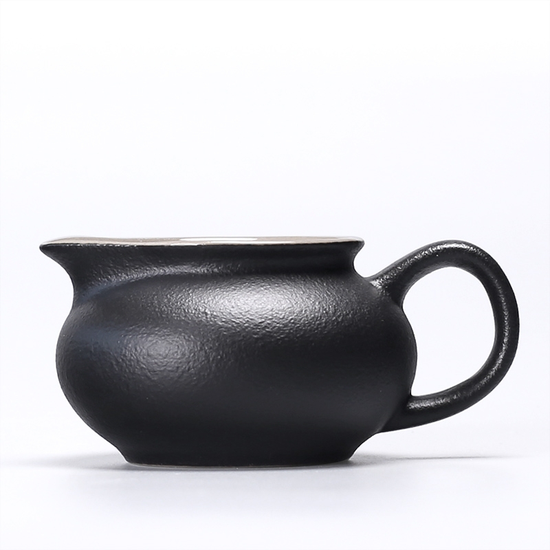 Qiao mu coarse pottery glaze stone fair keller of black points by hand and a cup of black zen tea cups