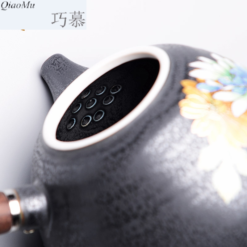 Qiao mu ancient tea exchanger with the ceramics glaze the teapot with wooden handle, side put the pot of kung fu tea set with parts by hand