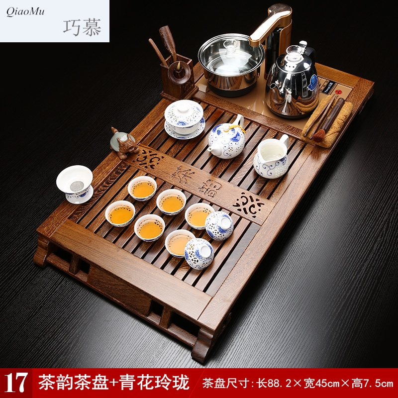 Qiao mu chicken wings wood tea set suit household purple high - grade kung fu tea set solid wood tea tray induction cooker