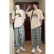 The little man wears a summer loose snowy mountain print short sleeve T-shirt men with panel casual pants a tide