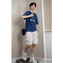The small man wears a summer short printed short sleeve T-shirt men loose handsome Harbour wind half sleeves casual set