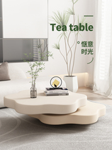 Modern cream wind petal tea several household designers with small household design simple creative network red irregular rotation tea table