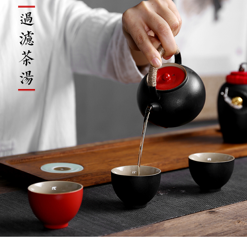 Sand embellish ceramic travel tea set of black suit and contracted Japanese ceramic vehicle is suing teapot portable package