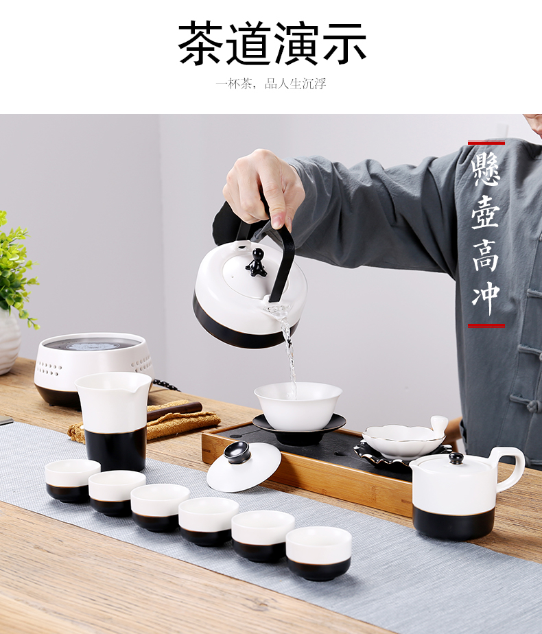 Sand embellish pottery sides kung fu tea set simple black and white porcelain paint TaoLu ceramic teapot teacup of a complete set of electricity