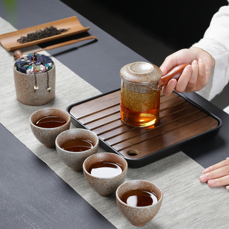 Portable travel tea set with four cups ceramic kung fu tea tray was Portable travel package a pot of tea set a small set of custom