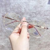 Очки миопии женщины могут быть оснащены большими круглыми гранями, тонкими винтивыми артефактами осциллографа, корейской версией корейского прилива мужчины