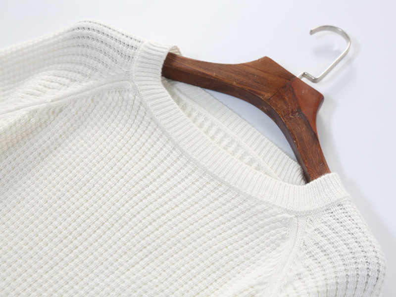 Autumn and winter high-end cashmere sweater women's round neck pullover loose short section thickened sweater lazy fashion bottoming shirt