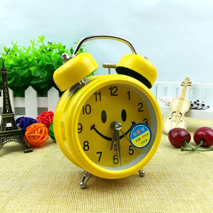Yellow smiley alarm clock creative student children's special cute cartoon small alarm clock Luminous mute bed clock