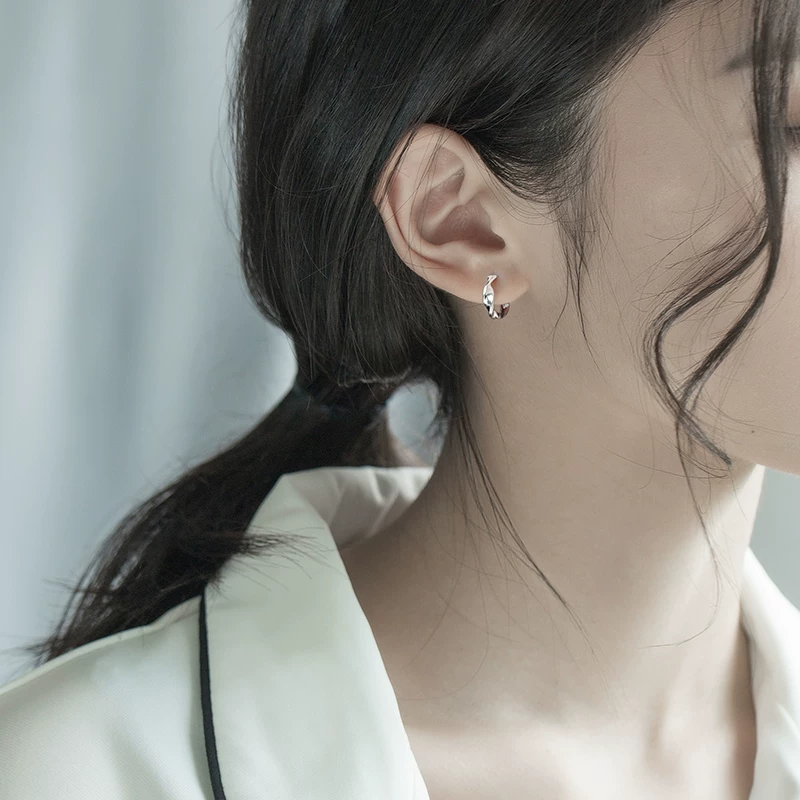 Small sophisticated design earrings, silver 925 sample