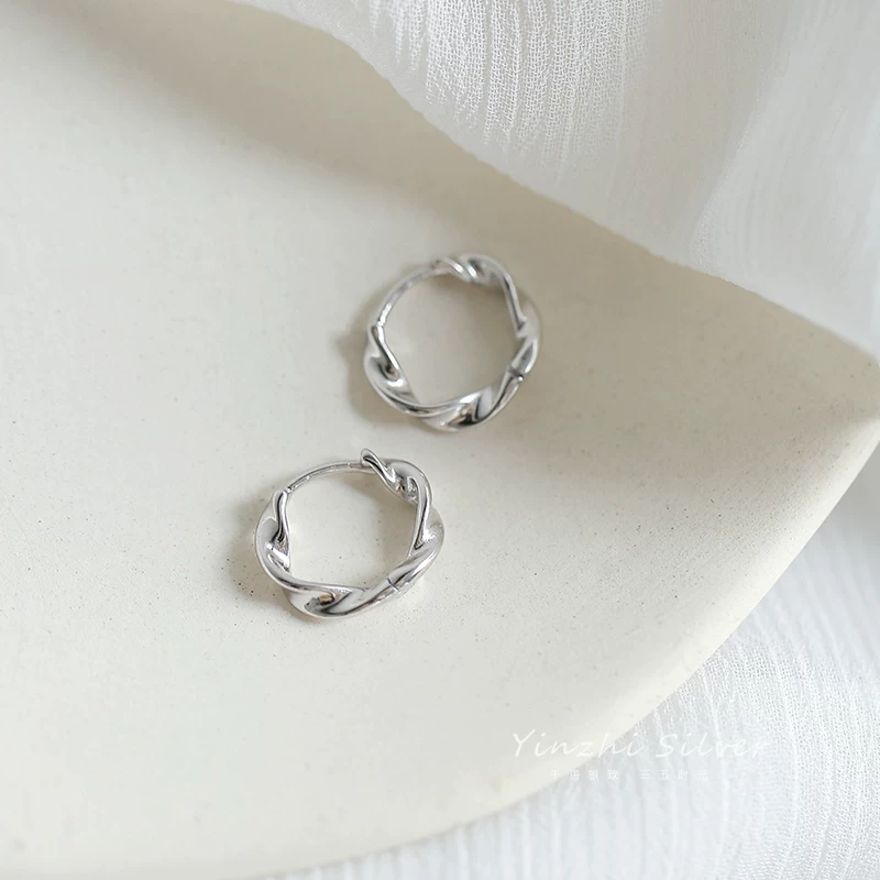 Small sophisticated design earrings, silver 925 sample