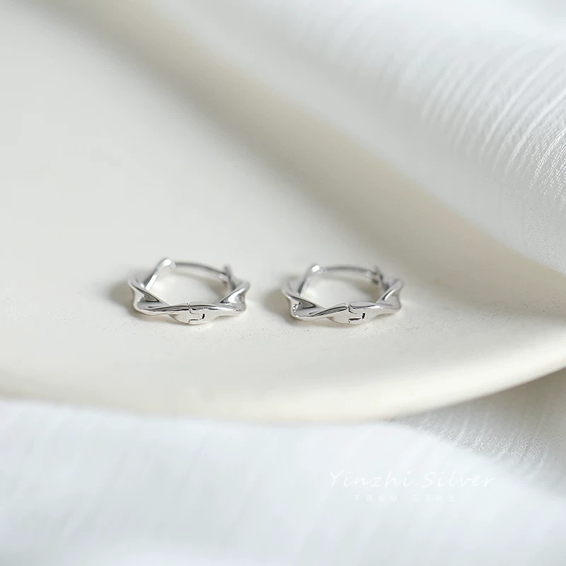 Small sophisticated design earrings, silver 925 sample