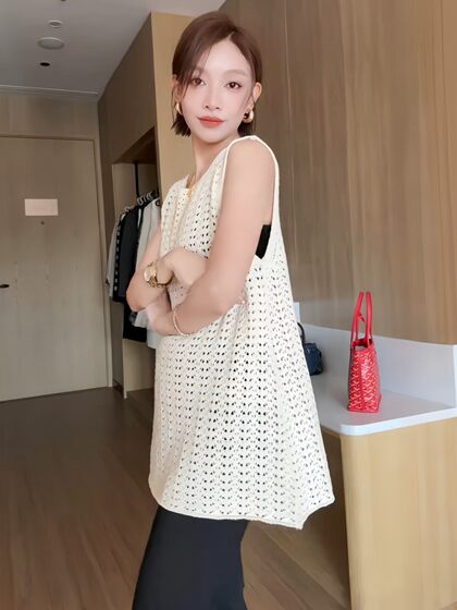 Korean Style Knitted Sweater Spring Wear for Women 2026 New Design Hollow-Out Mid-Length Sleeveless Vest Early Spring Top