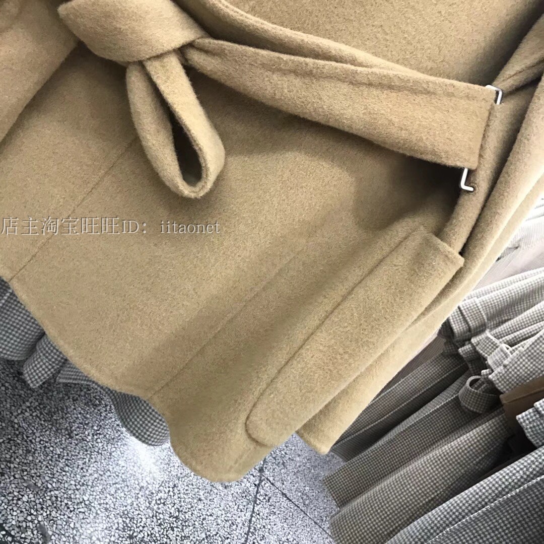 Phiên bản Hàn Quốc mới của áo len cashmere hai mặt khâu tay áo ngắn phần eo eo cá trích họa tiết vạt áo rộng vai áo khoác phao nữ