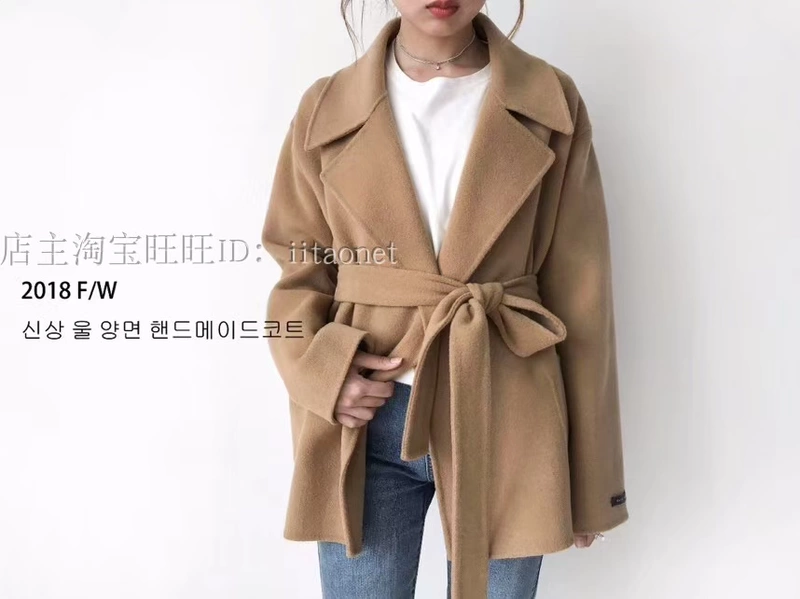Phiên bản Hàn Quốc mới của áo len cashmere hai mặt khâu tay áo ngắn phần eo eo cá trích họa tiết vạt áo rộng vai măng tô nữ