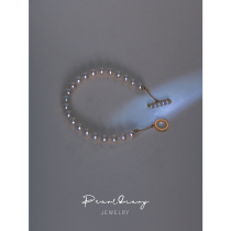 Balance beam pearl bracelet