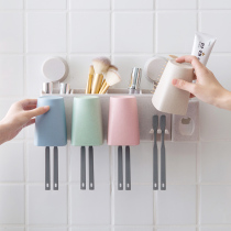 A rack on which electric toothbrush cups are placed on a