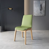 Цельное кожаное кресло зеленого цвета, цвет бревна