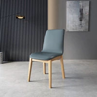 Цельное кожаное кресло цвета бревна синего цвета