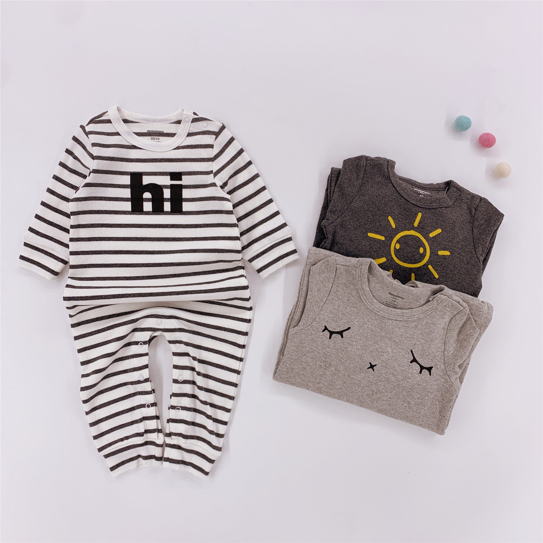 Baby jumpsuit spring and autumn thin section elastic sleeve head shoulder buckle male cotton 0-3 months 9 female 6 baby outing clothes