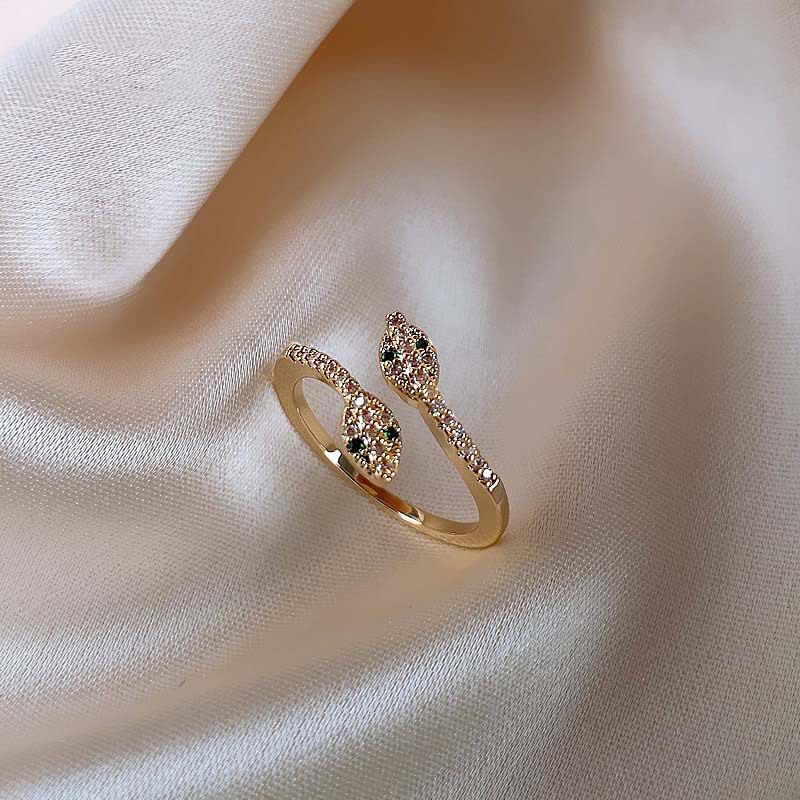 Korean style double-headed snake-shaped open ring with diamonds