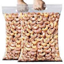 Large cashew kernel nuts in bulk weighed Chinese New Year dried fruits nuts pistachios macadamia nuts combined dried fruits