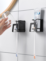 Stainless steel suction wall hanging toothbrush holder Creative viscose toothpaste gargle cup shelf free perforation toilet tooth cup