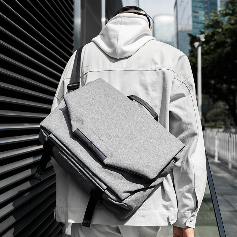 Hong Kong I Tgreg functions Single shoulder Shoulder Slanted Satchel Bag Male Brief student Bag Commuter Large Capacity Postman Computer Bag