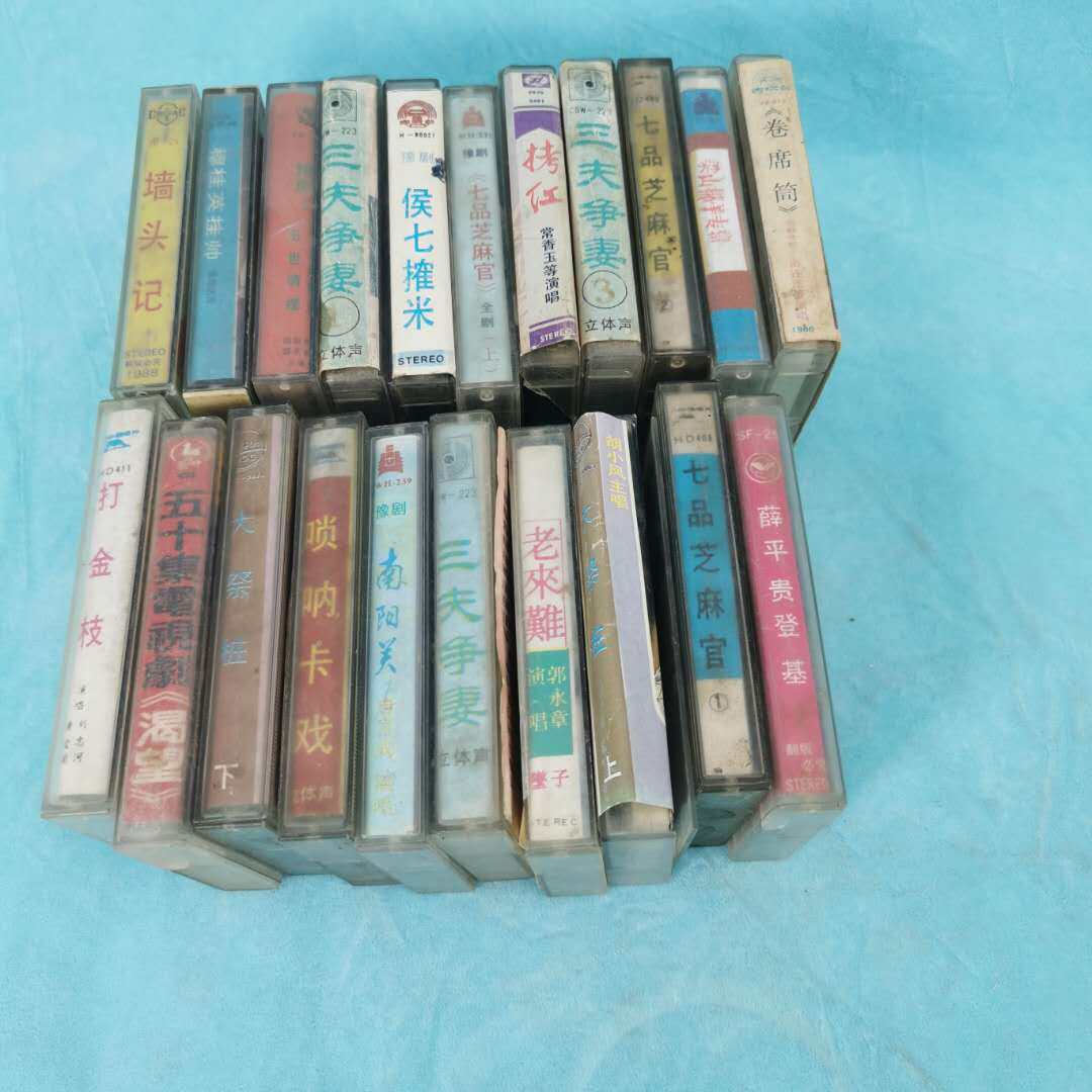 Second-hand old-fashioned tape cassettes pop music classic red culture nostalgic collection window display retro ornaments