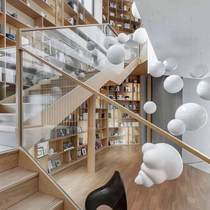 High-end customized villa spiral staircase tempered glass stair handrails modern minimalist light luxury solid wood interior