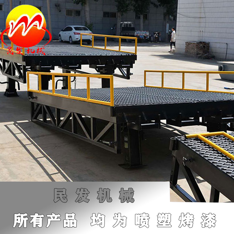 Two-style mobile den-bridge container loading and unloading platform fixed automatic lifting table crescent plate unloading hitch plate