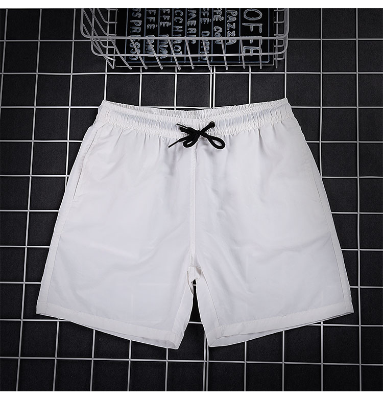 Quần short mùa hè của nam giới màu rắn năm quần quần thanh niên vài bãi biển quần khô nhanh thường ba quần thể thao quần người đàn ông quần sooc nam