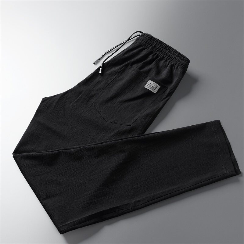 Summer thin casual pants men's black trousers versatile slim straight small feet Korean version of the trend summer pants ice silk