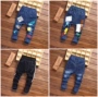 Quần jeans bé trai 2018 xuân hè mới phiên bản Hàn Quốc của quần thủy triều trẻ em quần quần trẻ em cá tính thoi trang tre em