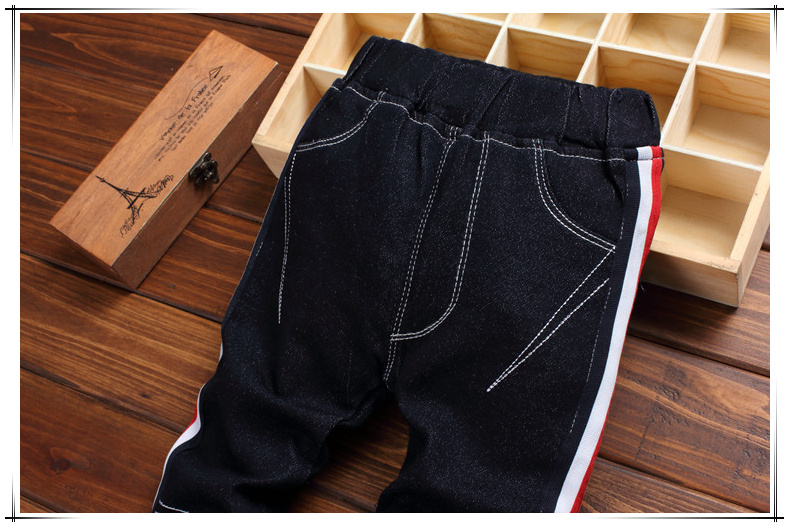 Quần jeans bé trai 2018 xuân hè mới phiên bản Hàn Quốc của quần thủy triều trẻ em quần quần trẻ em cá tính quần jean lửng trẻ em