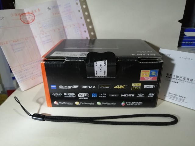 Sony black card R100X brochure warranty card and other original factory hand carrying rope