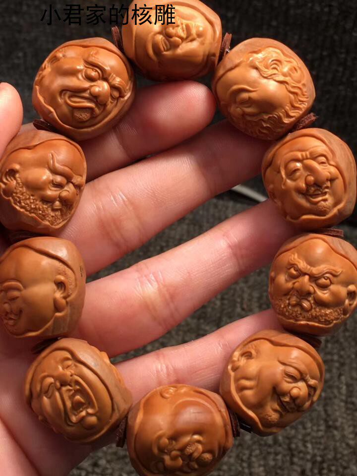 Olive core bracelet with big seeds, realistic eighteen arhats, playing handle pieces, pure handmade boutique olive and core carving bracelet
