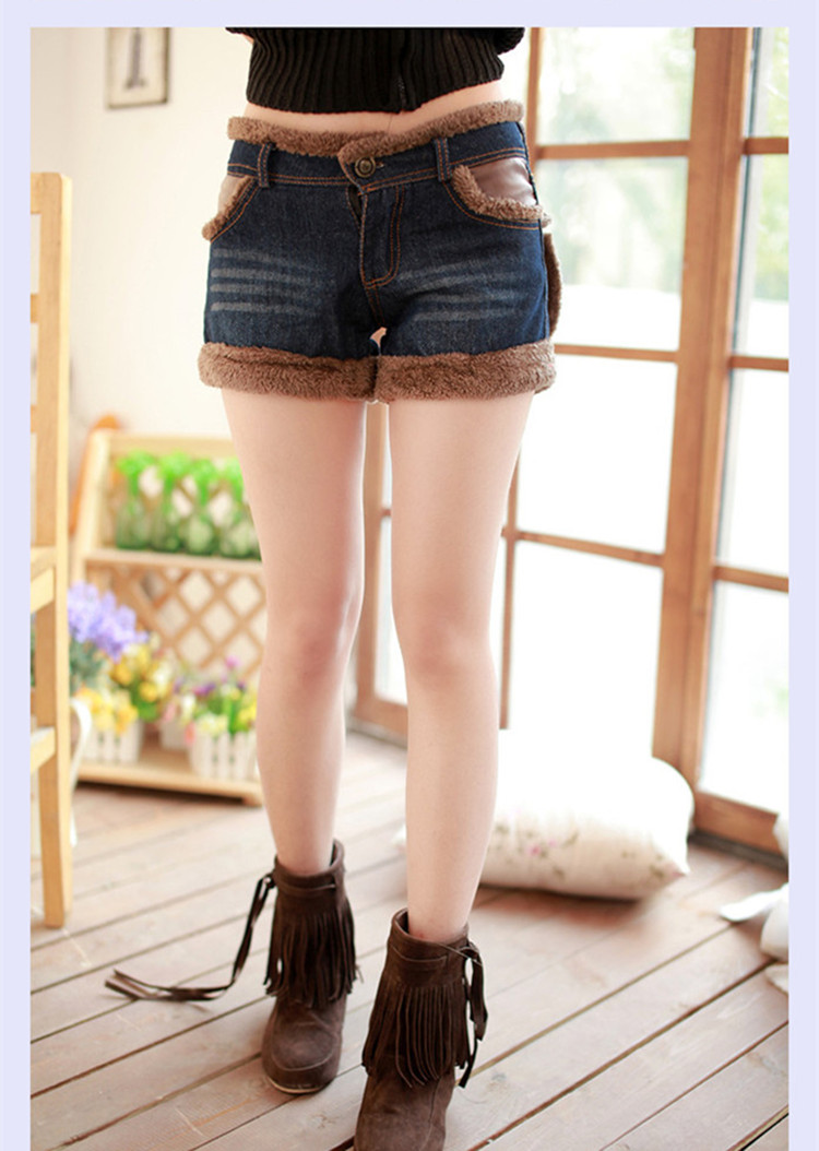 Phiên bản Hàn Quốc của Slim PU khâu da quần short viền sừng khóa quần quần nữ quần jeans mùa thu đông mới quần ngắn ống rộng