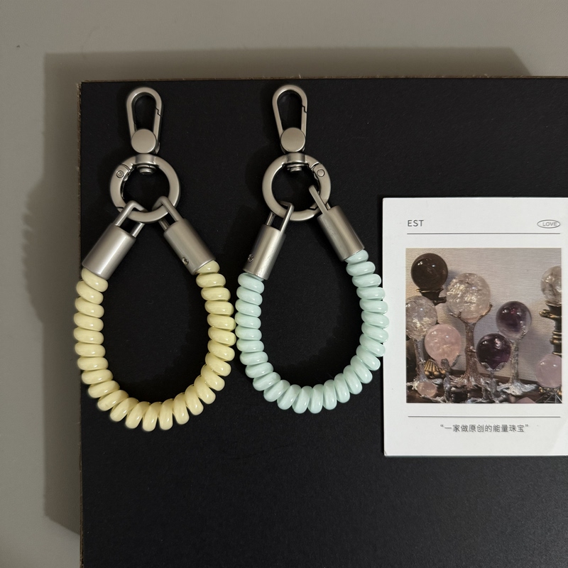 Gif Simple and Unique Telephone Cord Elastic Spring Hand Strap Keychain Suitable for Phone Cases, Bags, and Accessories Gif Simple and Unique Telephone Cord Elastic Spring Hand Strap Keychain Suitable for Phone Cases, Bags, and Accessories